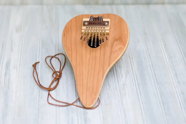 Half Shell Thumb Piano Acoustic Low Diatonic