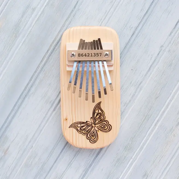 Butterfly Engraved Thumb Piano Low Diatonic Pine